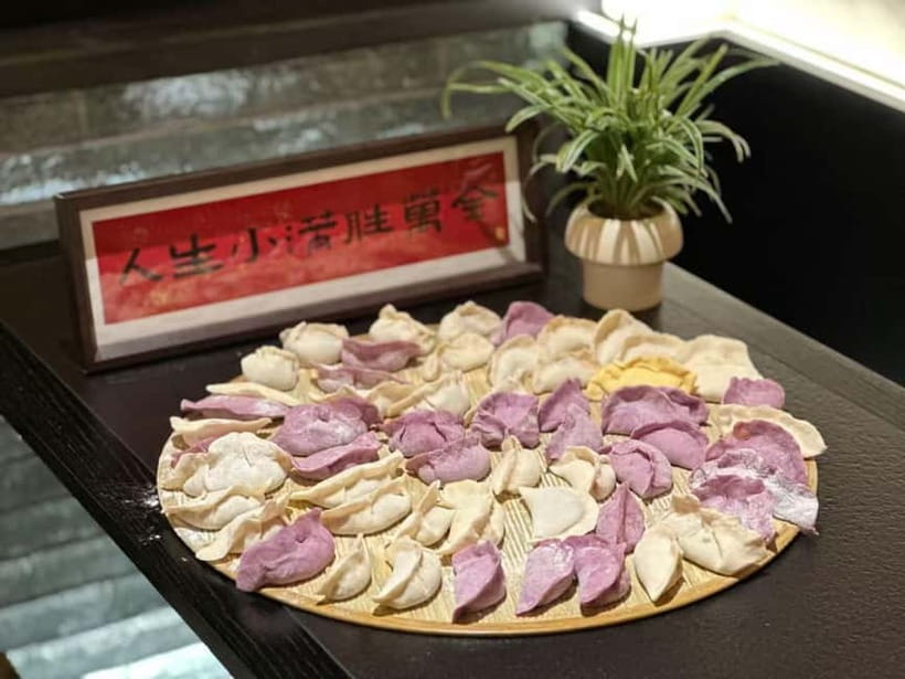 Beijing: Dumpling Making Workshop with Meal and Tea - The communal dinner: tea pairing, extra dishes, and beer
