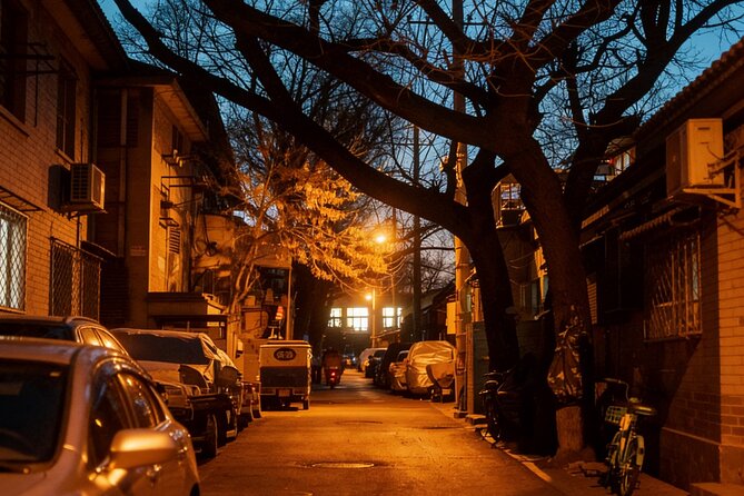 Beijing Hutong Night Tour with Yunnan Style Dinner and Chartered Boat Ride at Houhai Lake - Shichahai lakeside walking and Yandai Xie Street: ending with slanting hutong charm