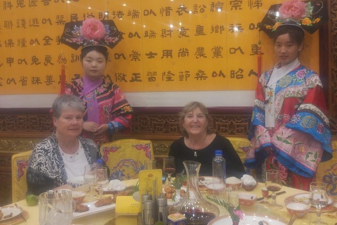 Beijing Imperial Dining Experience at Bai Jia Da Yuan Restaurant with Houhai Lake Bar Tour - Night sightseeing drive: Bird’s Nest, Water Cube, and the city’s old bones