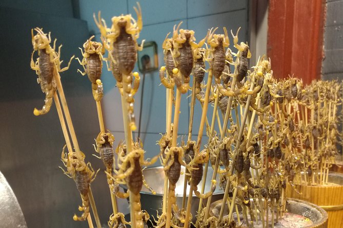 Beijing Night Walking Tour - Xian Yu Kou Food Street archway: street energy without forcing a meal
