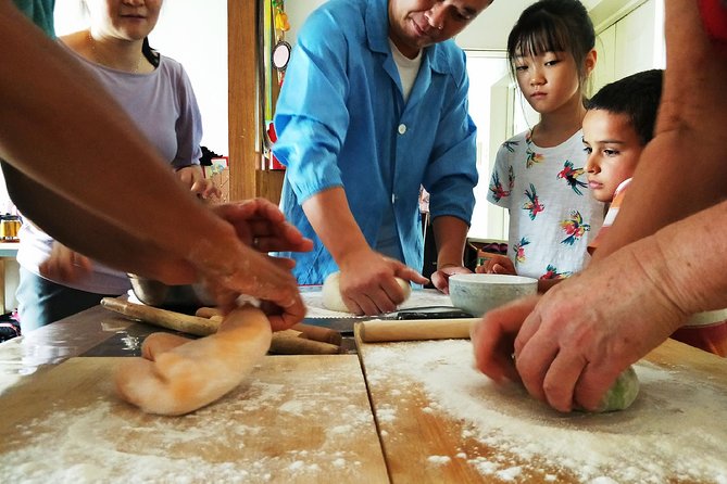 Beijing: Private Dumpling Cooking Class in Local Family - Meeting the Family: Hospitality, Language, and Kids