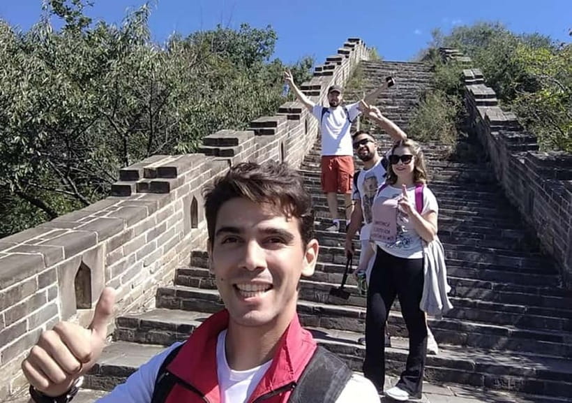 Mutianyu Great Wall 5-KM Guided Hike with Uphill Cable Car - Lunch and recovery at MuBus: tea, snacks, and a real meal option