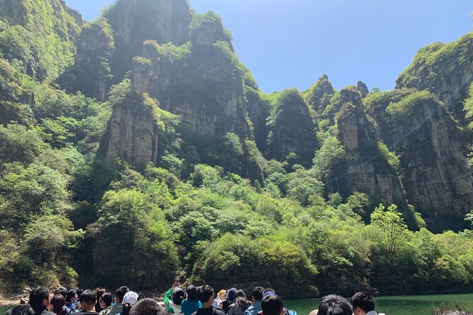 Private Day Tour to Longqing Gorge and Dingling at the Ming Tombs with Lunch and Boat Ride - Longqing Gorge: the Flying Dragon escalator and the aquamarine cruise