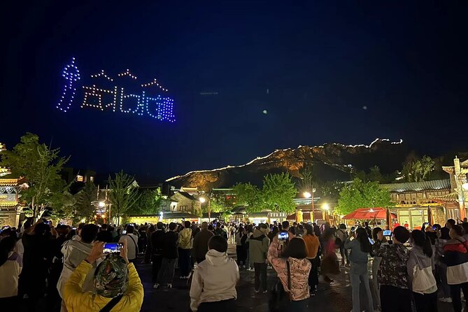 Private Evening Tour to Simatai Great Wall and Gubei Water Town - Gubei Water Town after dark: fountains, lights, and easy walking
