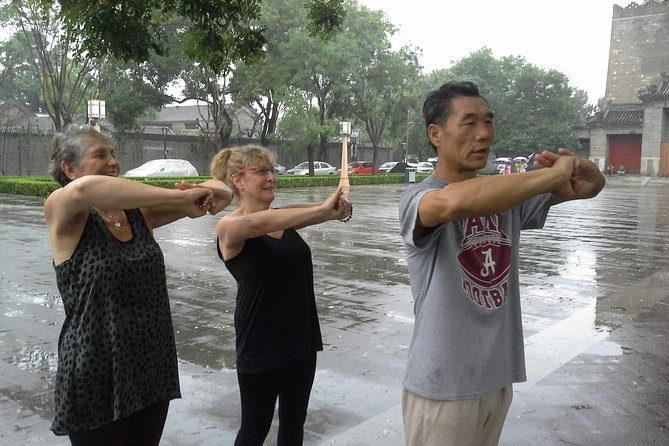 Private Tour-Beijing Hutong Foodie and Seal Carving Experience - Tai chi at Bell and Drum Tower Square: start where locals already are