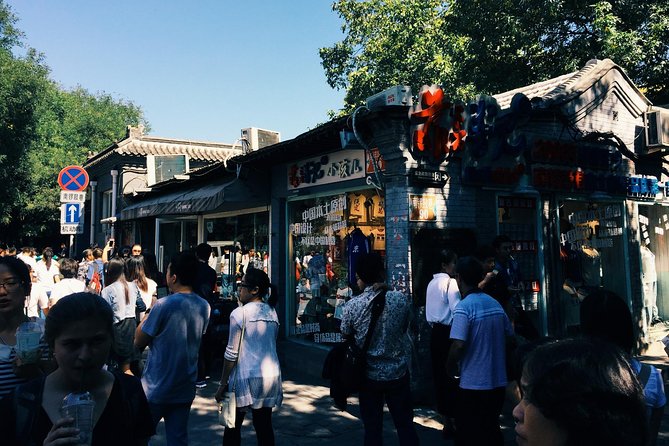 Private Tour: Beijing Hutong Night Walking and snacks Taste - Imperial City Park after dark: locals using public space