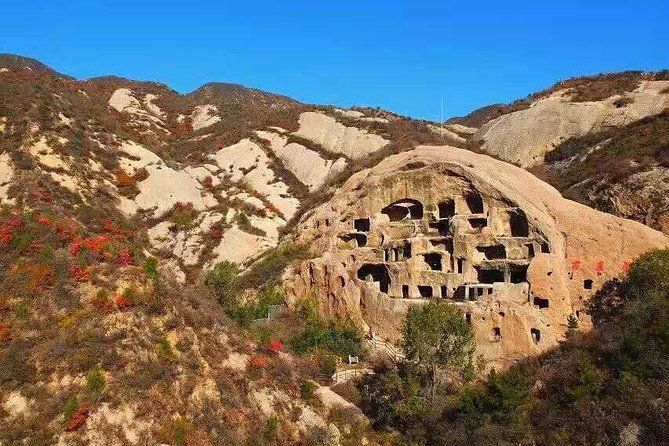 Private Transfer to Longqing Gorge and Guyaju Caves Excursion by English Driver - Tickets, cable car, and boats: what you should budget on the day